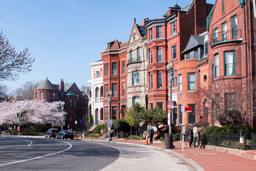 A row of tall brick houses in Washington, DC. Photo by Yeon Choi on Unsplash.