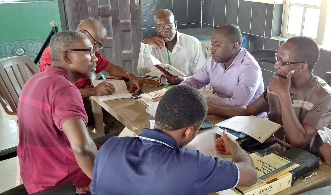 Dennis with students in Nigeria